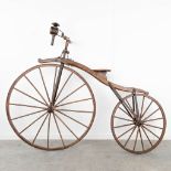 An antique Velocipde bicycle, wood frame with metal, 19th century. (L: 63 x W: 184 x H: 145 cm)