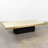 A mid-century coffee table, brass on a wood base, signed Roland Le Fvre. (L: 70 x W: 140 x H: 32,5
