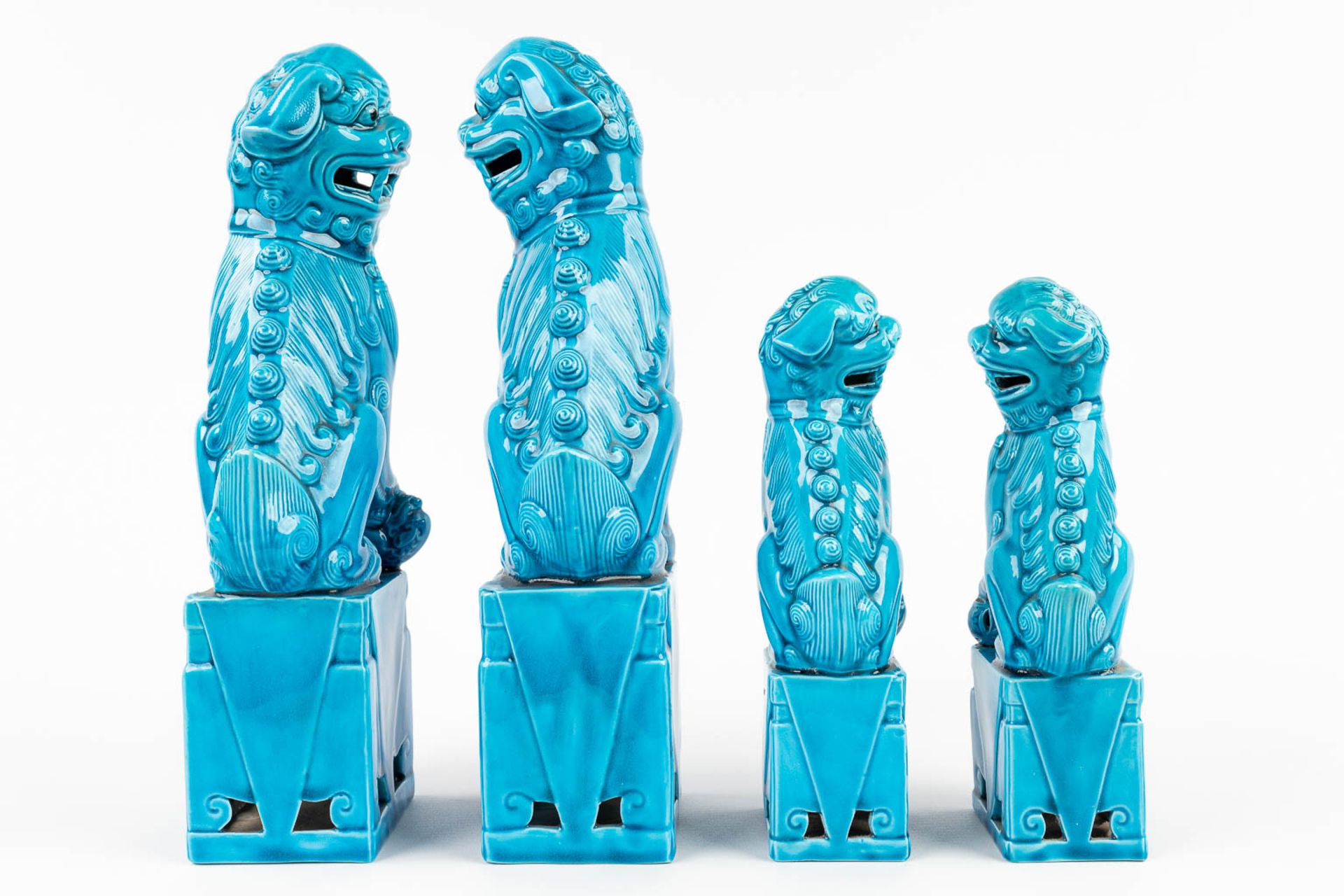 A collection of 2 pairs of Foo dogs, made of blue glazed ceramics. 20th C. (L: 8 x W: 11 x H: 30 cm) - Image 4 of 12