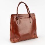 Delvaux, a vintage Tote-bag made of brown leather. Circa 1970. (W: 35 x H: 36 cm)