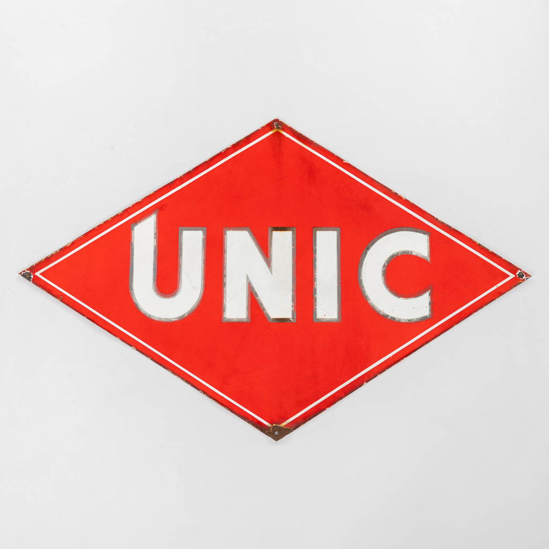 Unic, a double-faced enamelled plate. (W: 120 x H: 76 cm)
