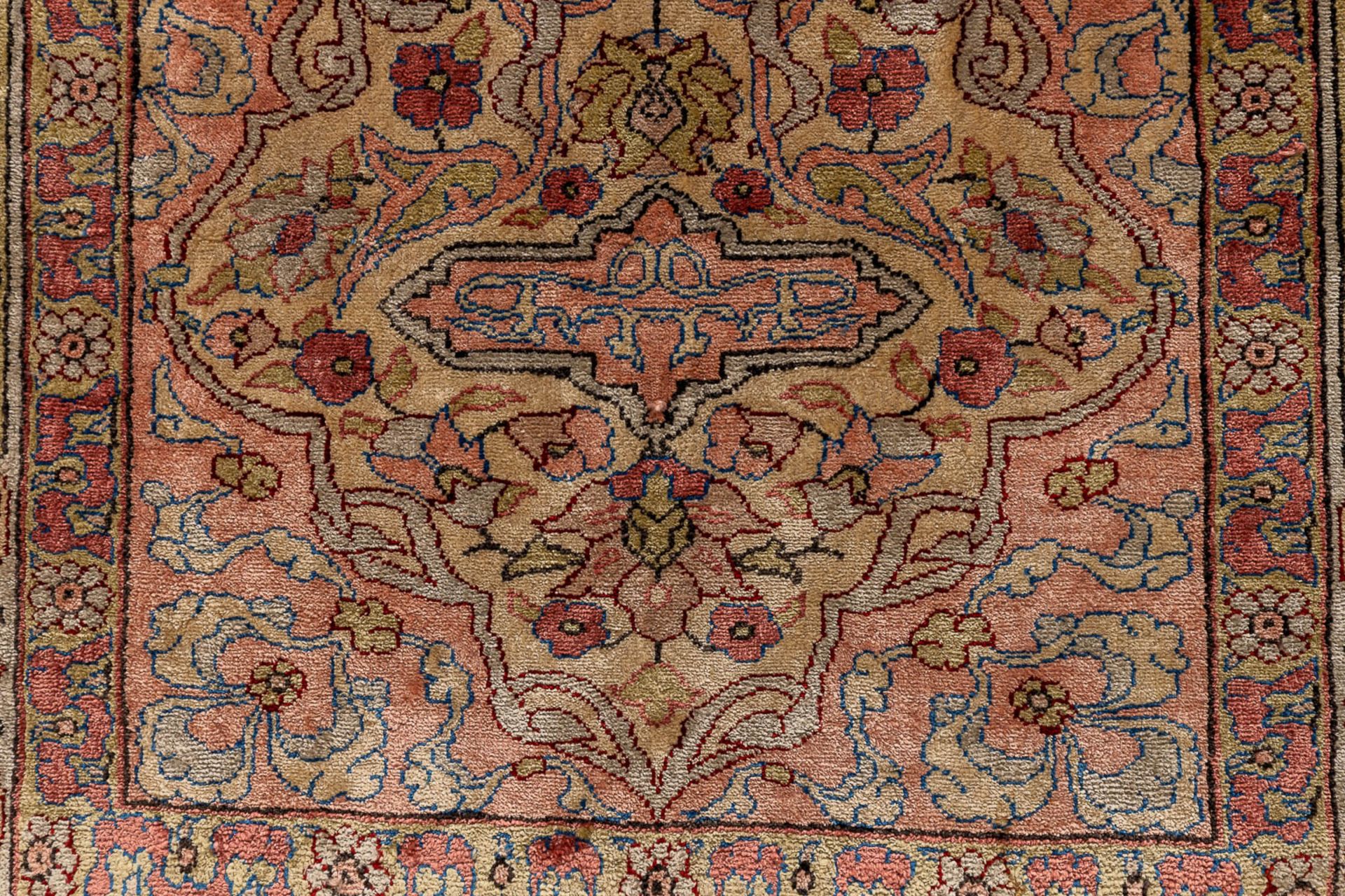 An Oriental hand-made carpet, silk. Hereke. (L: 60 x W: 92 cm) - Image 4 of 7