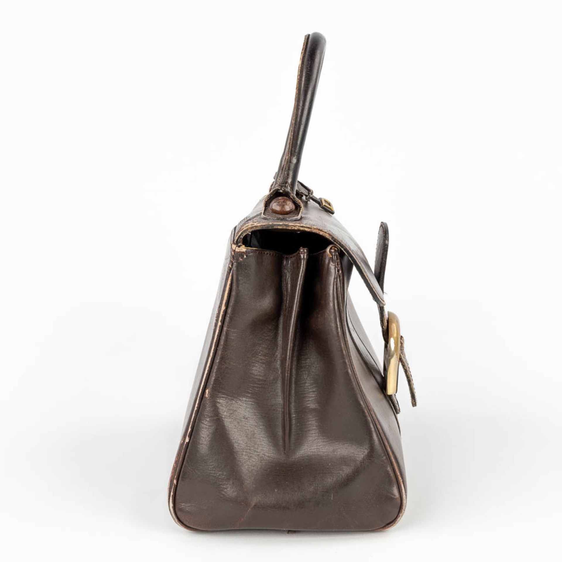 Delvaux Brillant PM, a handbag made of dark brown leather. Circa 1950. (W: 26 x H: 30 cm) - Image 6 of 19