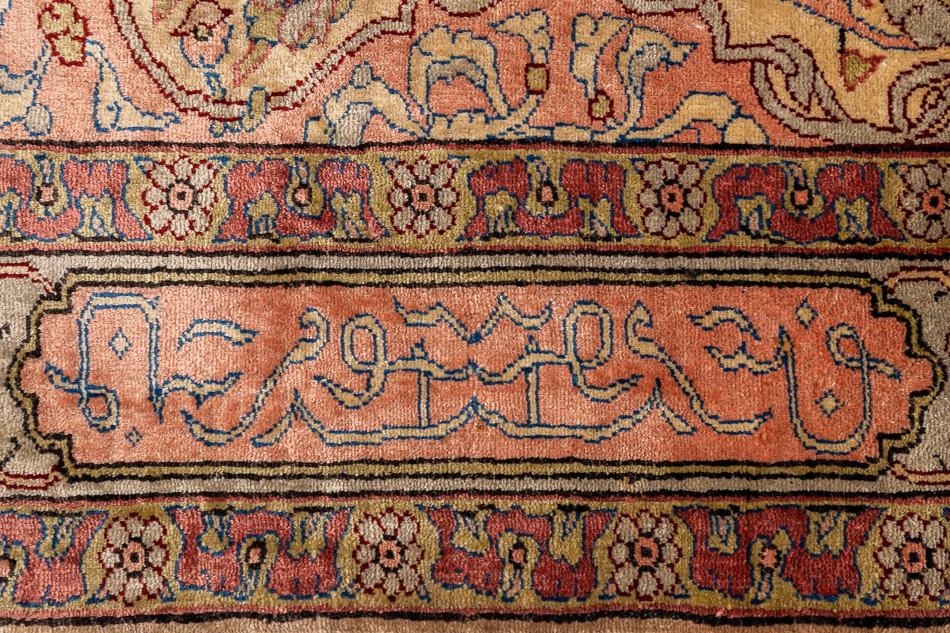 An Oriental hand-made carpet, silk. Hereke. (L: 60 x W: 92 cm) - Image 5 of 7