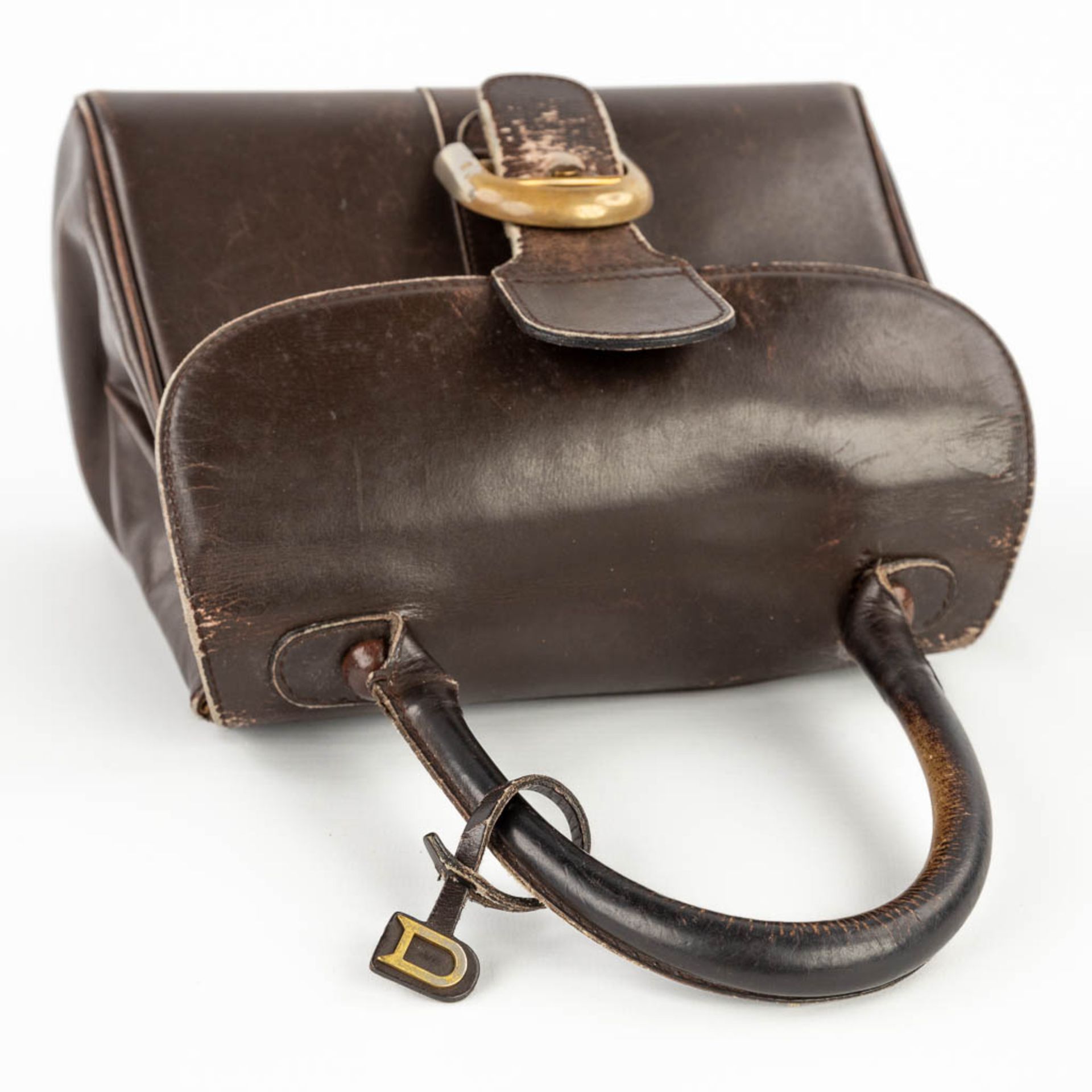 Delvaux Brillant PM, a handbag made of dark brown leather. Circa 1950. (W: 26 x H: 30 cm) - Image 8 of 19