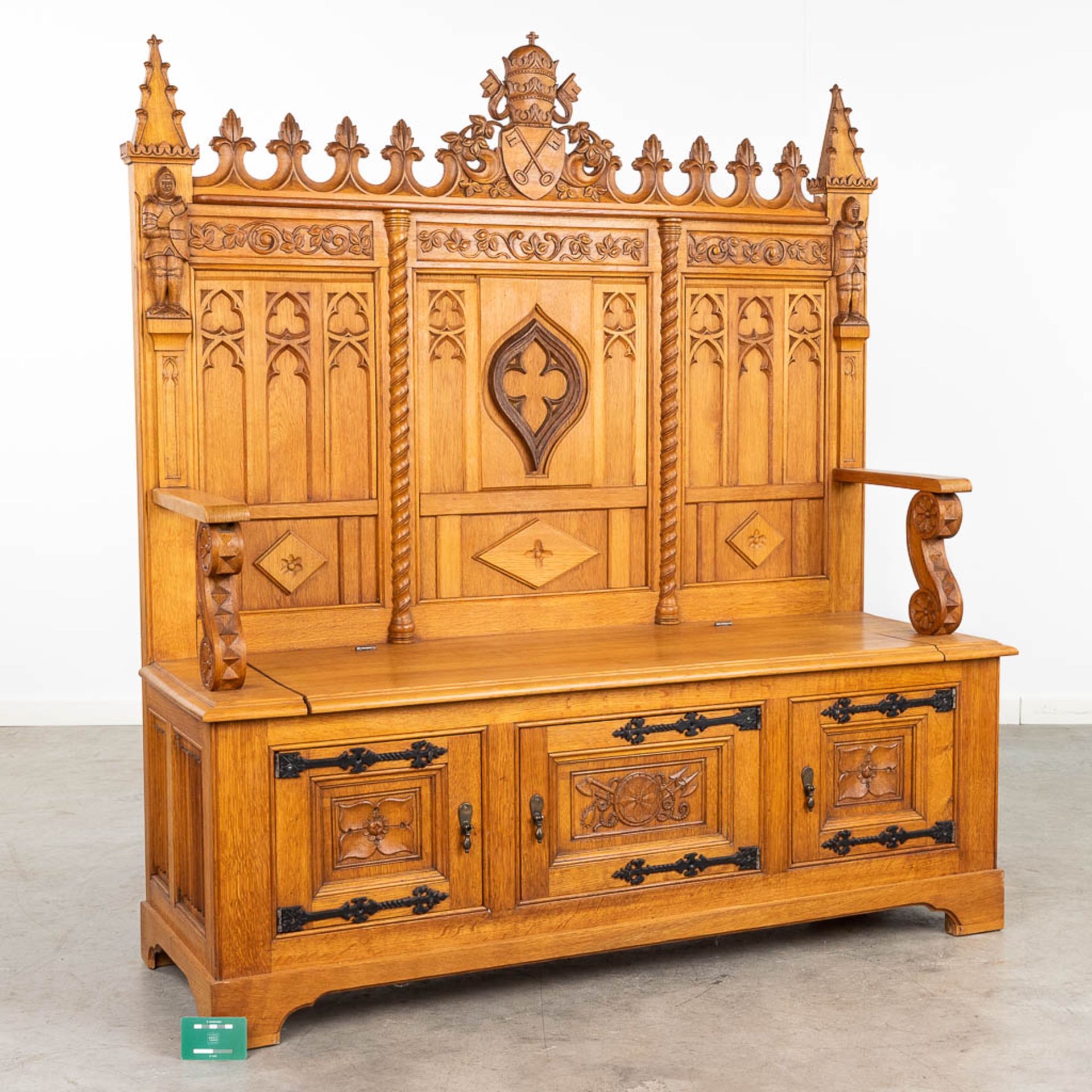 A large and antique bench finished with wood sculptured in a Gothic Revival style. 20th century. (L: - Image 2 of 16