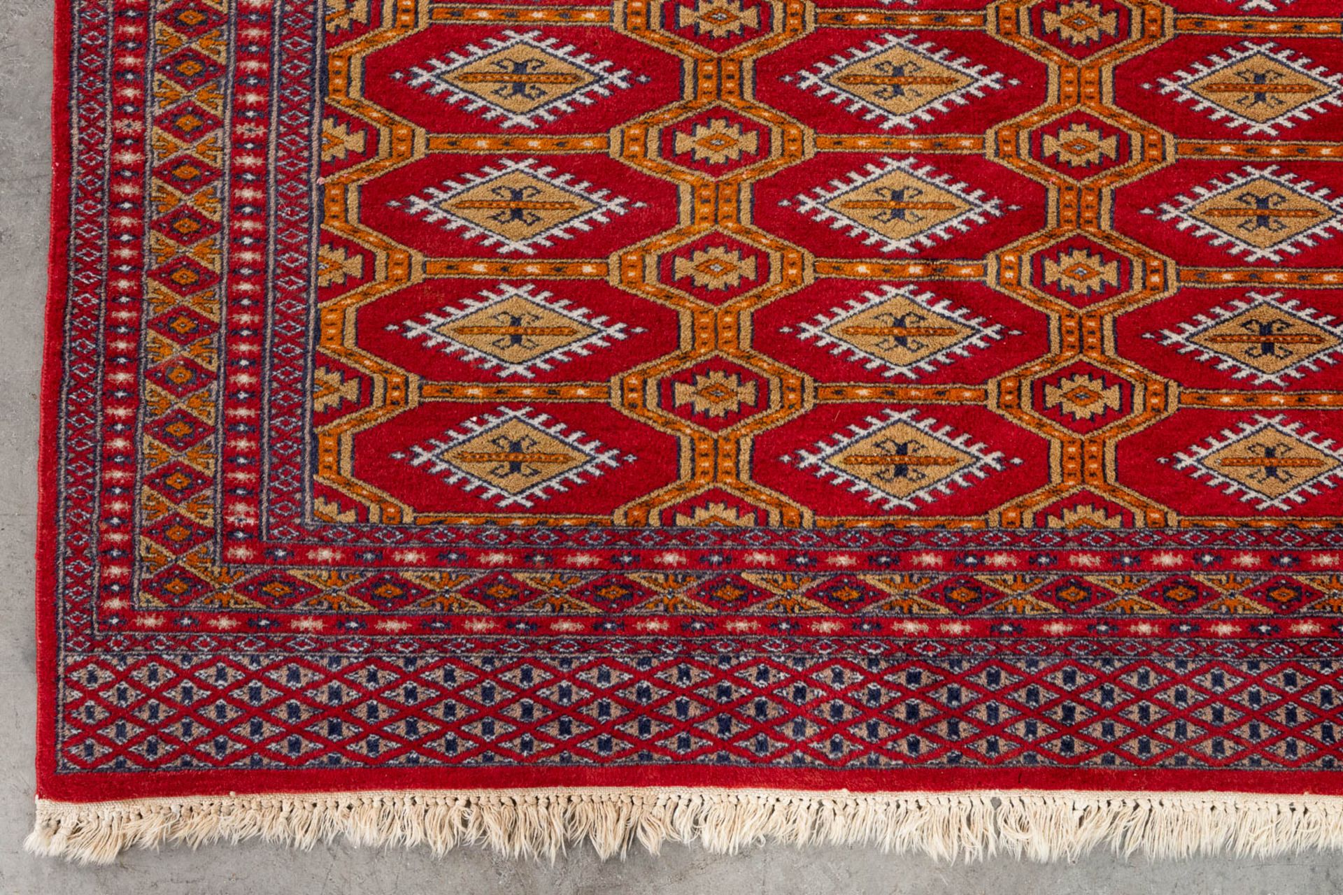 A set of 2 Oriental hand-made carpets, Bokhara/Buchara. (125 x 87 cm)(124 x 170 cm). (L: 124 x W: 17 - Image 8 of 11