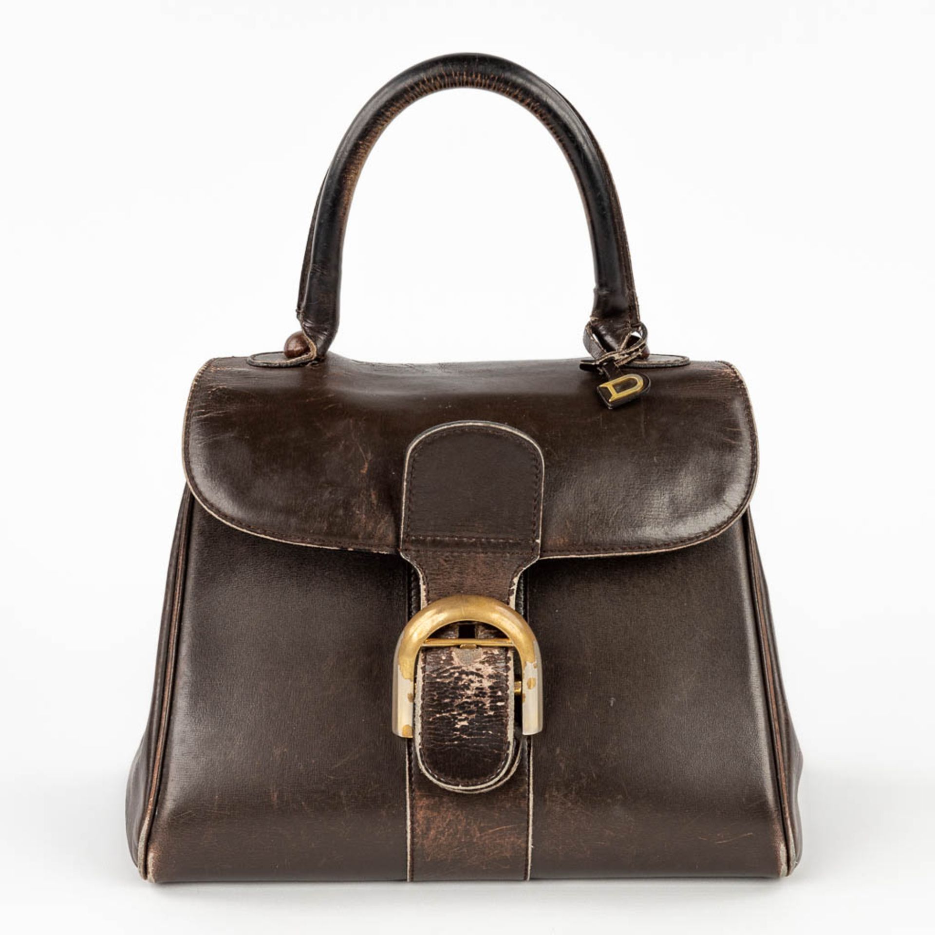 Delvaux Brillant PM, a handbag made of dark brown leather. Circa 1950. (W: 26 x H: 30 cm)