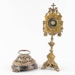 An altar bell and monstrance, silver plated metal and brass. (L: 12 x W: 17 x H: 52 cm)