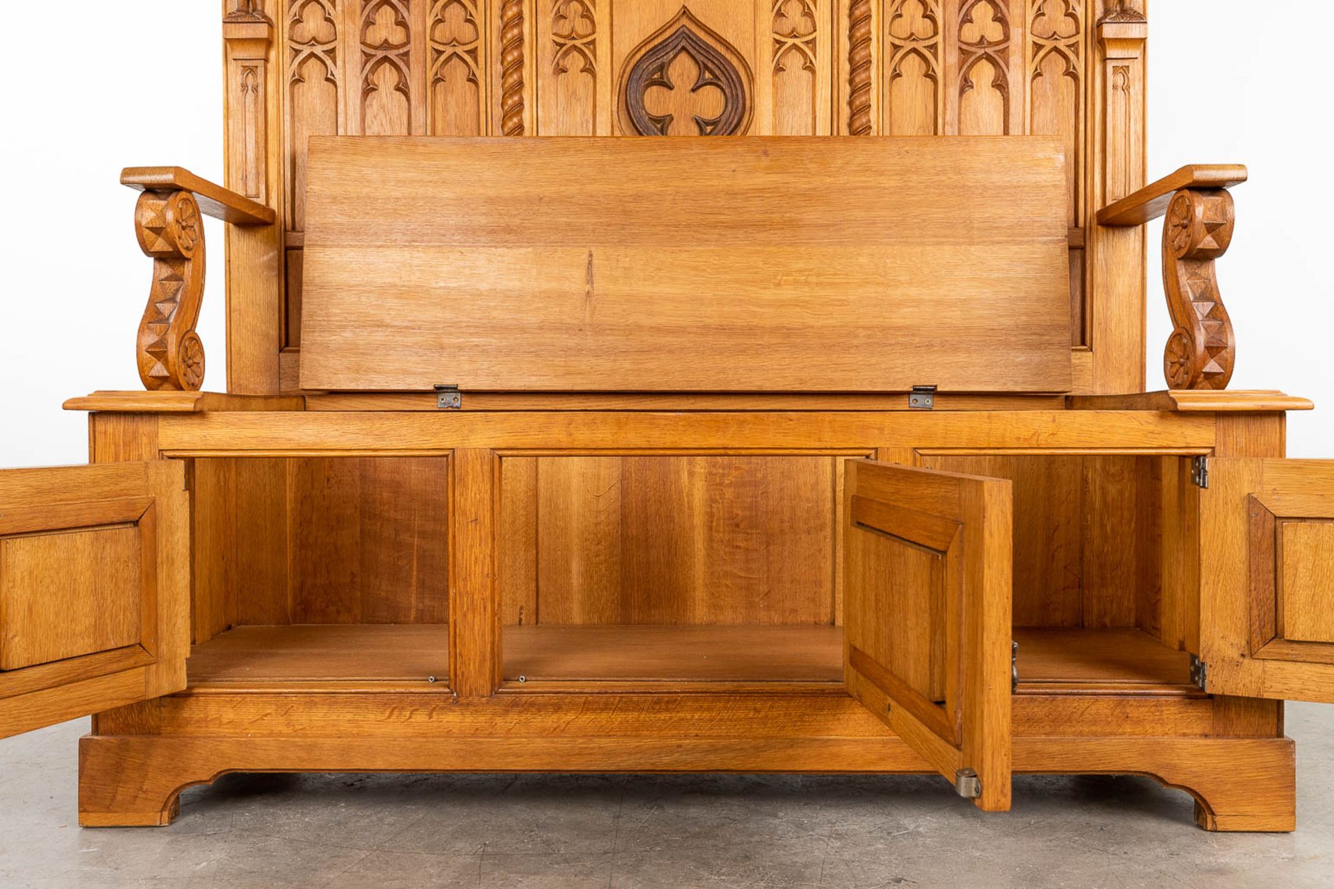 A large and antique bench finished with wood sculptured in a Gothic Revival style. 20th century. (L: - Image 16 of 16