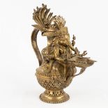 An incense burner made of bronze, decorated with a Ganesha figurine. (L: 31 x W: 18 x H: 36 cm)