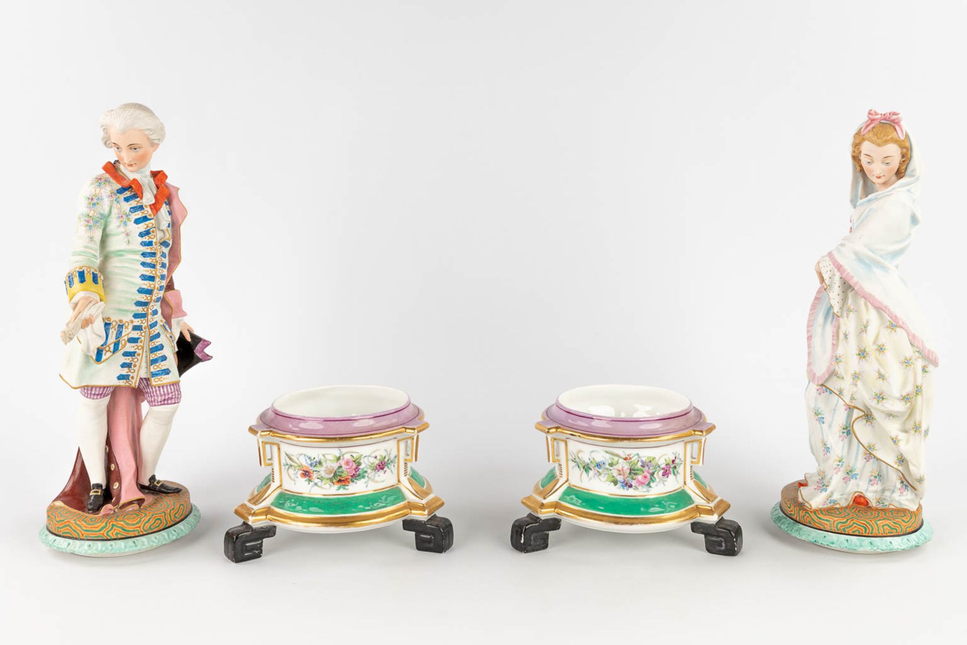 A pair of antique bisque figurines, standing on a glazed porcelain base. (L: 18 x W: 18 x H: 49 cm) - Image 8 of 24