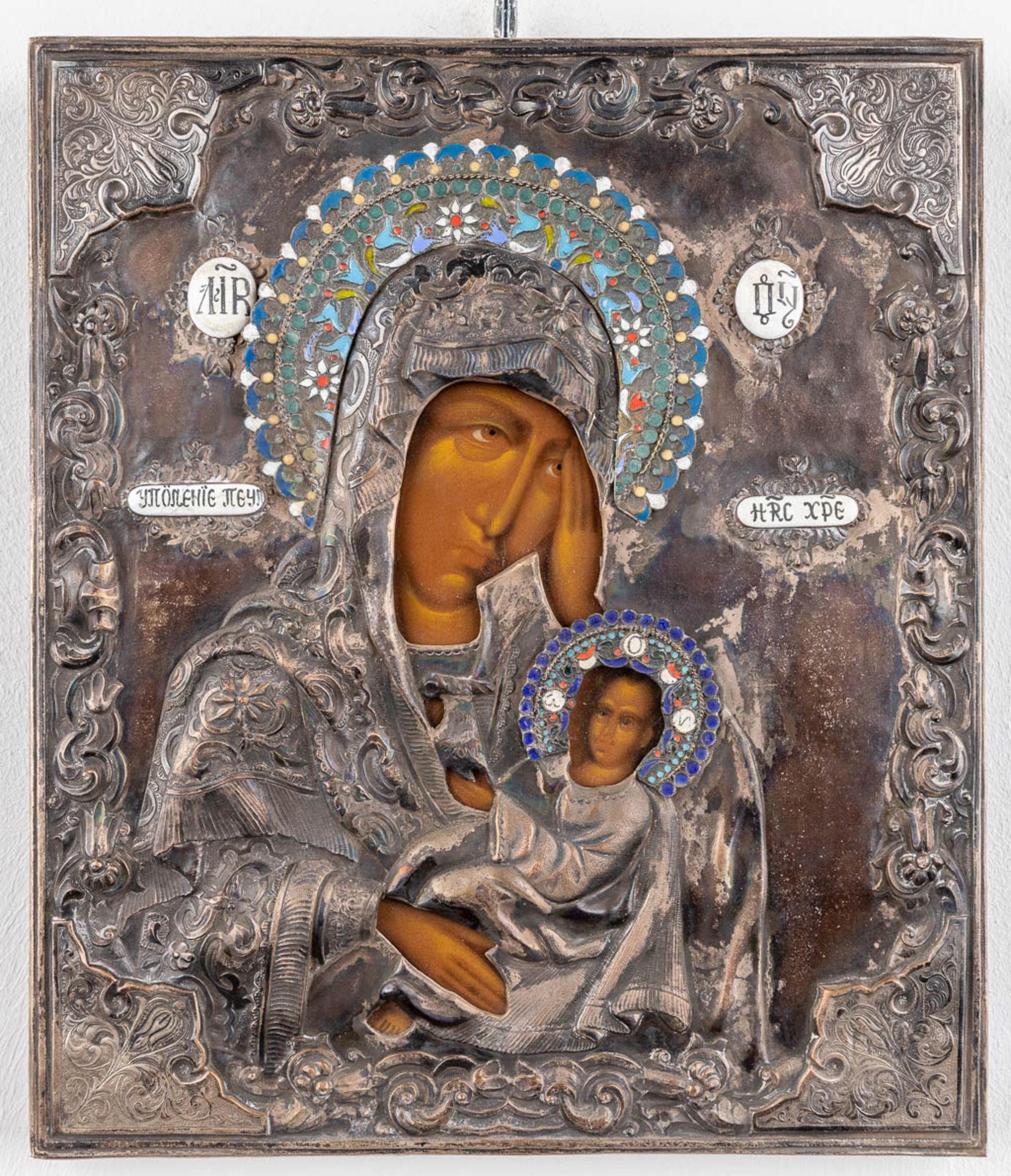 An Eastern-European icon, Madonna with child. Silver-plated metal and enamel. (W: 27 x H: 31 cm) - Image 3 of 10