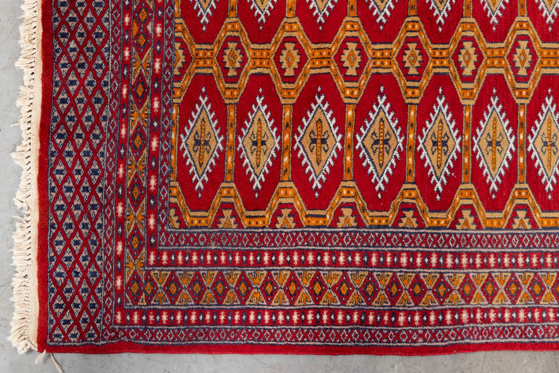 A set of 2 Oriental hand-made carpets, Bokhara/Buchara. (125 x 87 cm)(124 x 170 cm). (L: 124 x W: 17 - Image 7 of 11