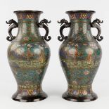 A pair of Oriental bronze vases with champsleve decor. (H: 37 x D: 18 cm)