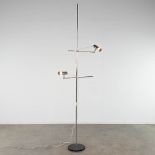 A standing lamp with 2 points of light, acrylic and chromed metal, circa 1970. (W: 68 x H: 242 cm)