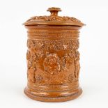 An antique tobacco jar made of grs. 19th century. (H: 25 x D: 18,5 cm)