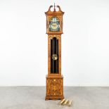 A standing clock finished with marquetery inlay. 20th C. (L: 26 x W: 42,5 x H: 208 cm)