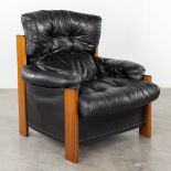 Tobia SCARPA (1935) 'Armchair', leather and wood. (L: 90 x W: 98 x H: 100 cm)