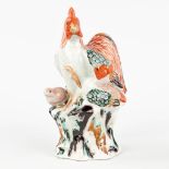 A Japanese porcelain figurative Chicken and her chicks. Porcelain. 19th century. (L: 7,5 x W: 9,5 x