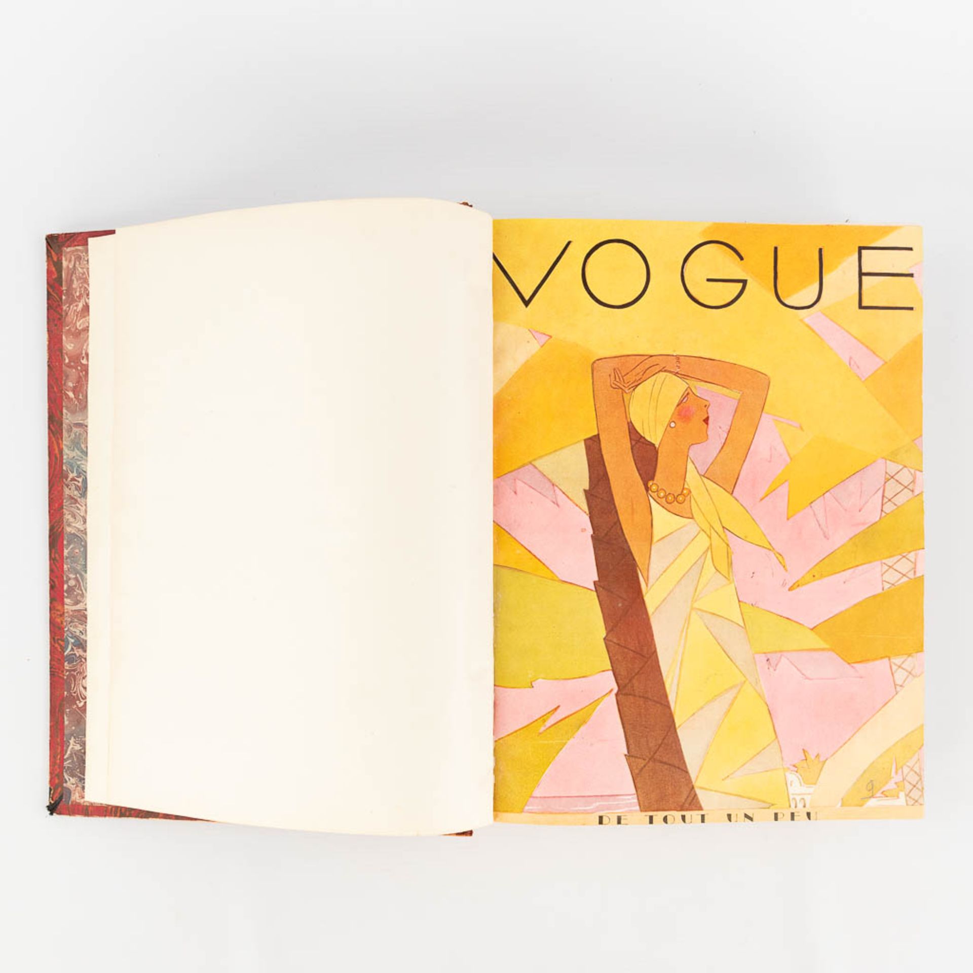 An assembled book with the Vogue magazine, 1929. (L: 5 x W: 25,5 x H: 31,5 cm)