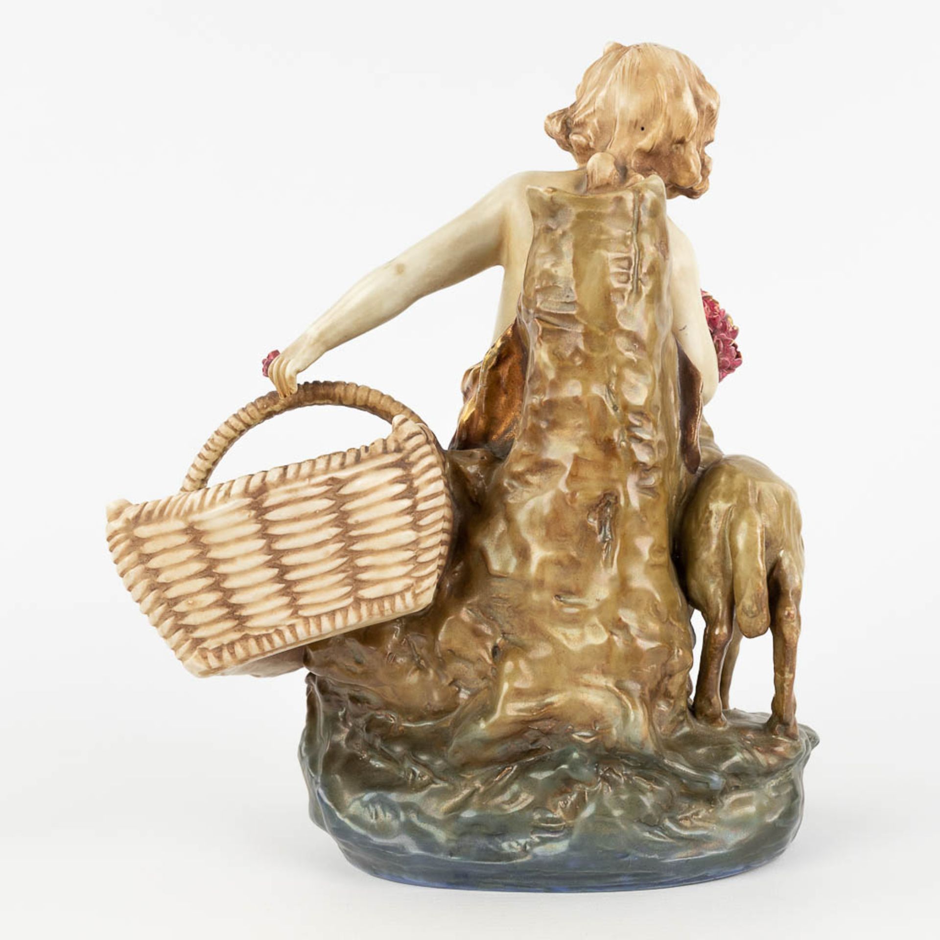 Amphora Austria, 'Child with a basket and sheep' made of glazed faience. (L: 18 x W: 24 x H: 29,5 cm - Image 5 of 14