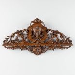 An antique wood-sculptured wall rack for spoons, decorated with a Jester figurine. 19th C. (L: 9,5 x