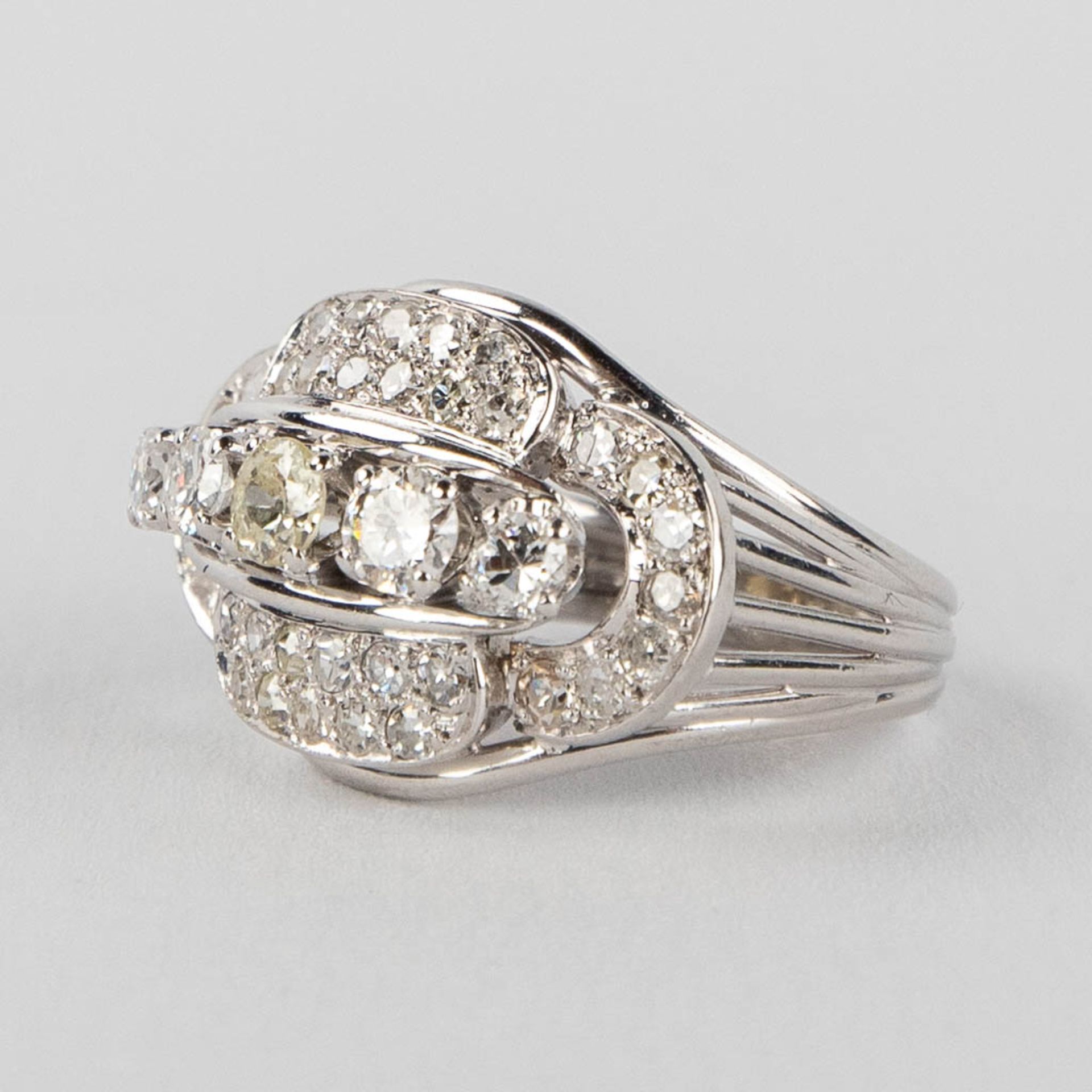 An antique ring with 5 larger and 36 smaller brilliants, in a platinum ring. 9,57g. size: 53 - Image 6 of 12