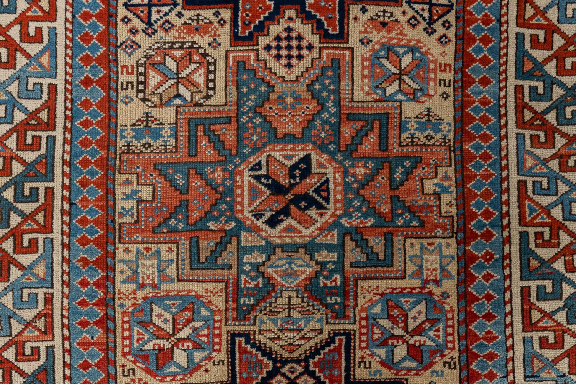 A collection of 2 Oriental hand-made carpets. Probably Caucasian. (L: 277 x W: 115 cm) - Image 6 of 12