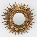 A small and vintage sunburst mirror, sculptured wood and a convex mirror. (D: 24 cm)