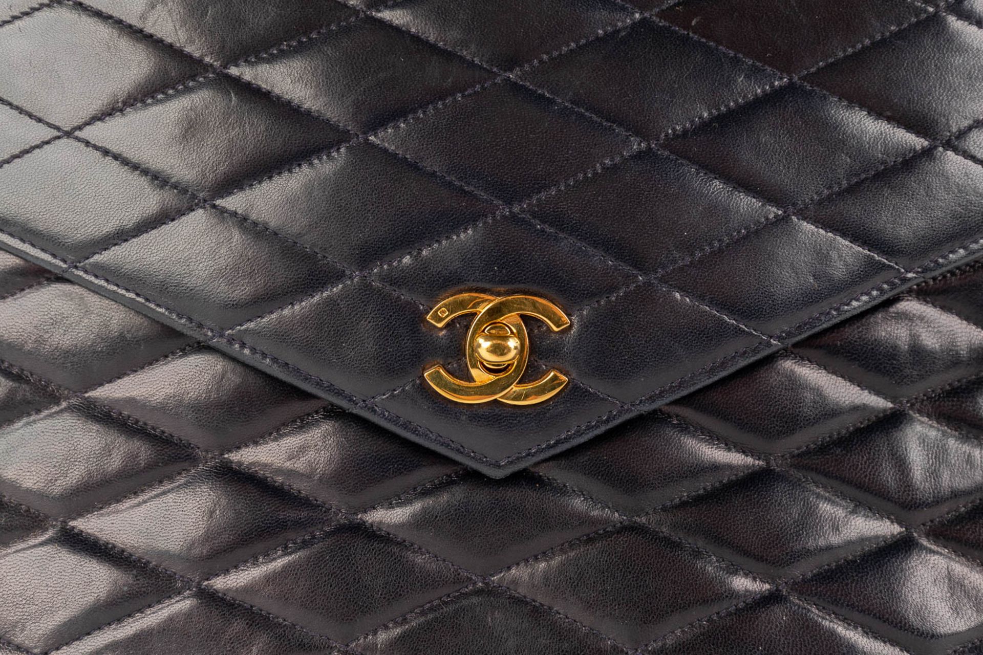 Chanel, a handbag made of dark blue/black leather with gold-plated hardware. Circa 1970. (W: 25 x H: - Image 11 of 18