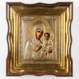An antique Icon, an Image of Madonna with a child, silver overlay. Saint Petersburg, 19th C. (W: 40,