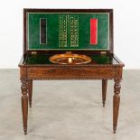 An antique game table with Roulette, Checkers, Chess and card-playing top. 19th C. (L: 46 x W: 92 x