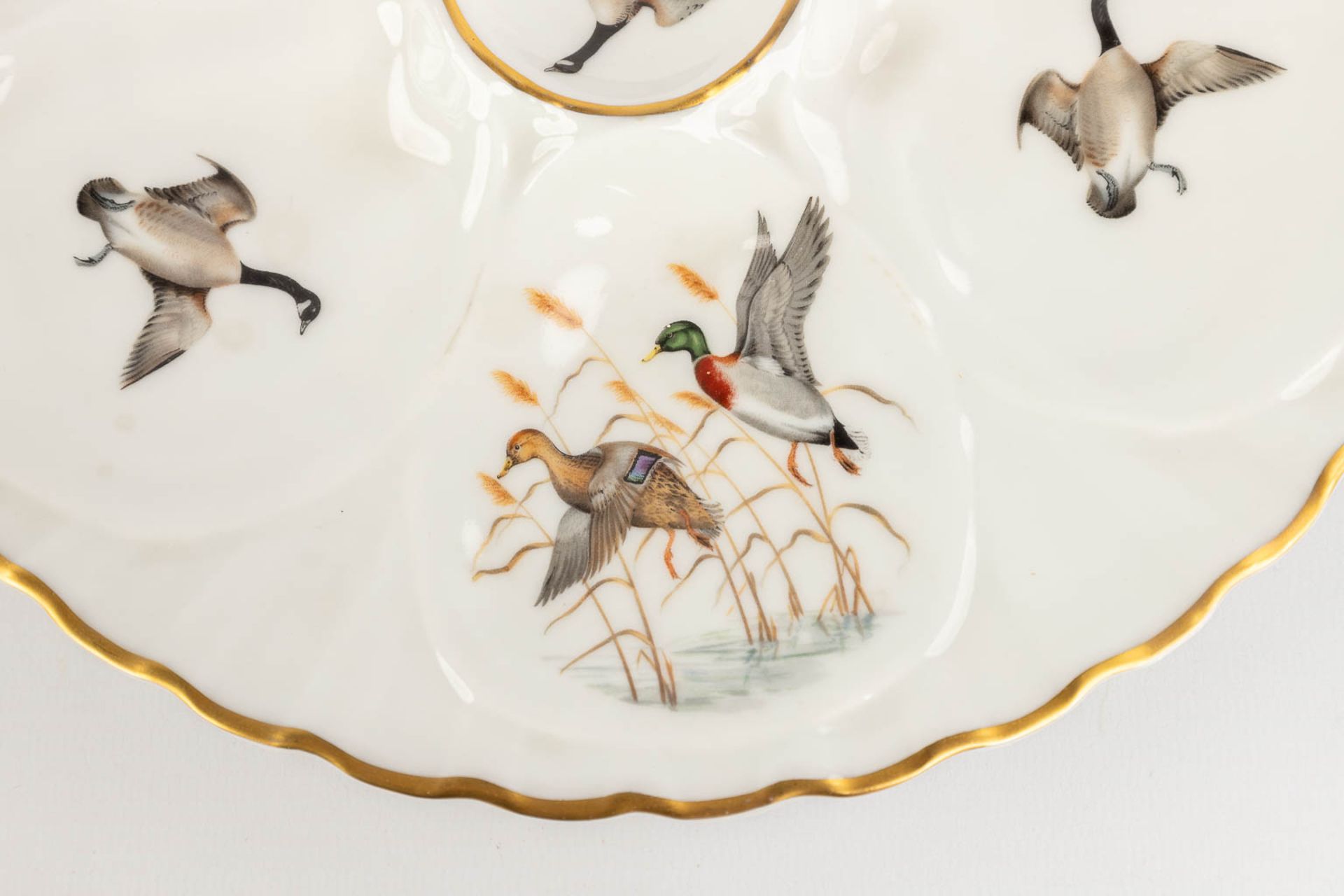 Porcelaine De Paris, France, a collection of 12 oyster plates decorated with birds. 20th C. (D: 23 c - Image 11 of 14