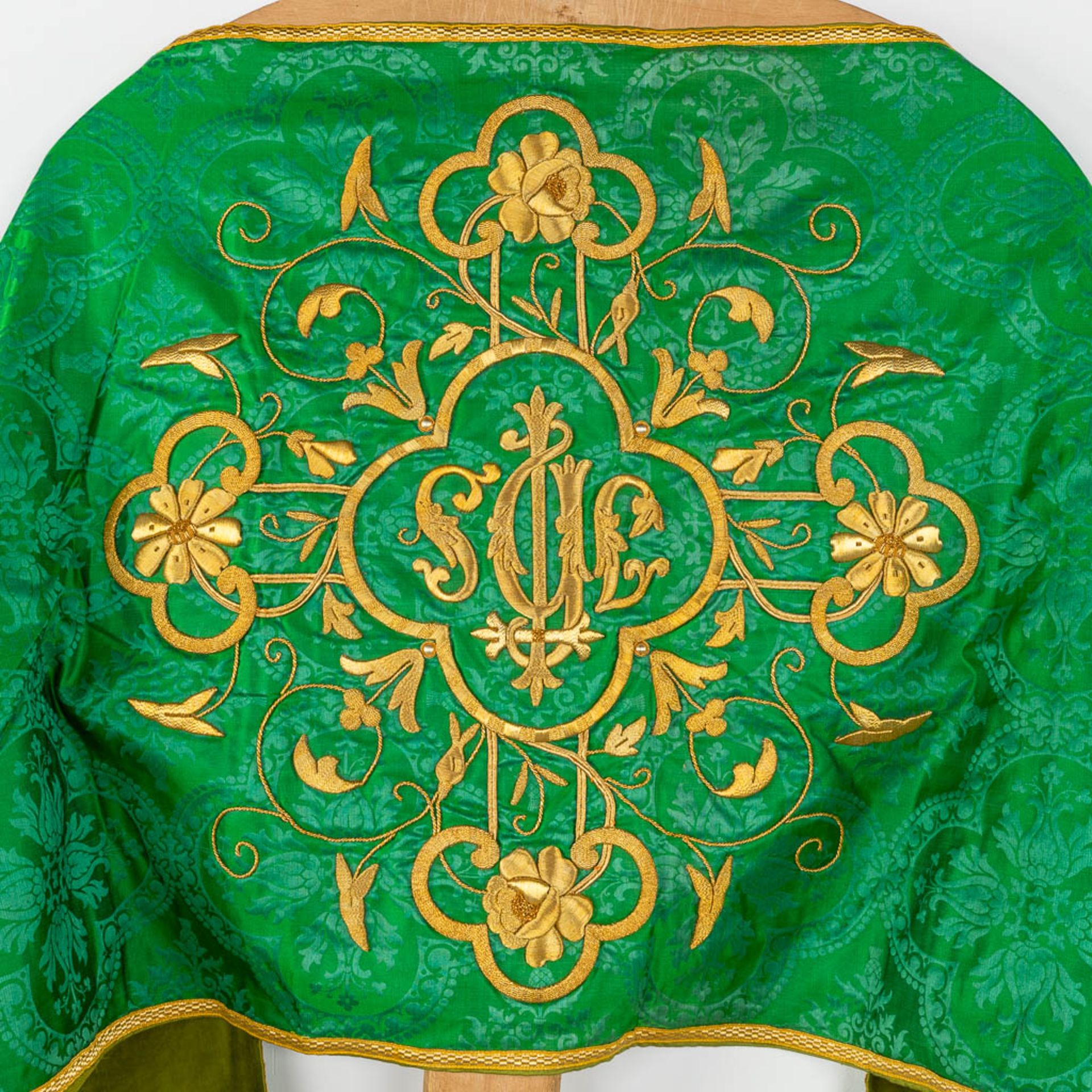 A Cope and Humeral Veil, finished with thick gold thread and green fabric and the IHS logo. - Image 11 of 14