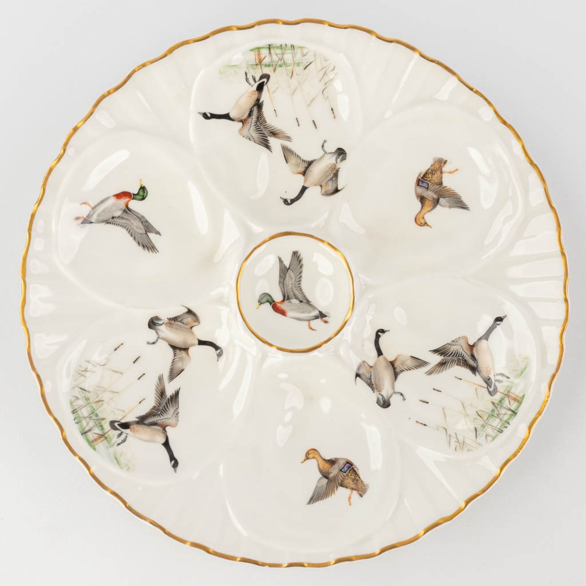 Porcelaine De Paris, France, a collection of 12 oyster plates decorated with birds. 20th C. (D: 23 c - Image 6 of 14