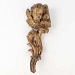 An antique wood-sculptured angel figurine. 18th/19th century. (L: 9 x W: 17 x H: 42 cm)