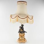 A table lamp with a reading angel figurine, bronze. 20th C. (L: 15 x W: 22 x H: 62 cm)