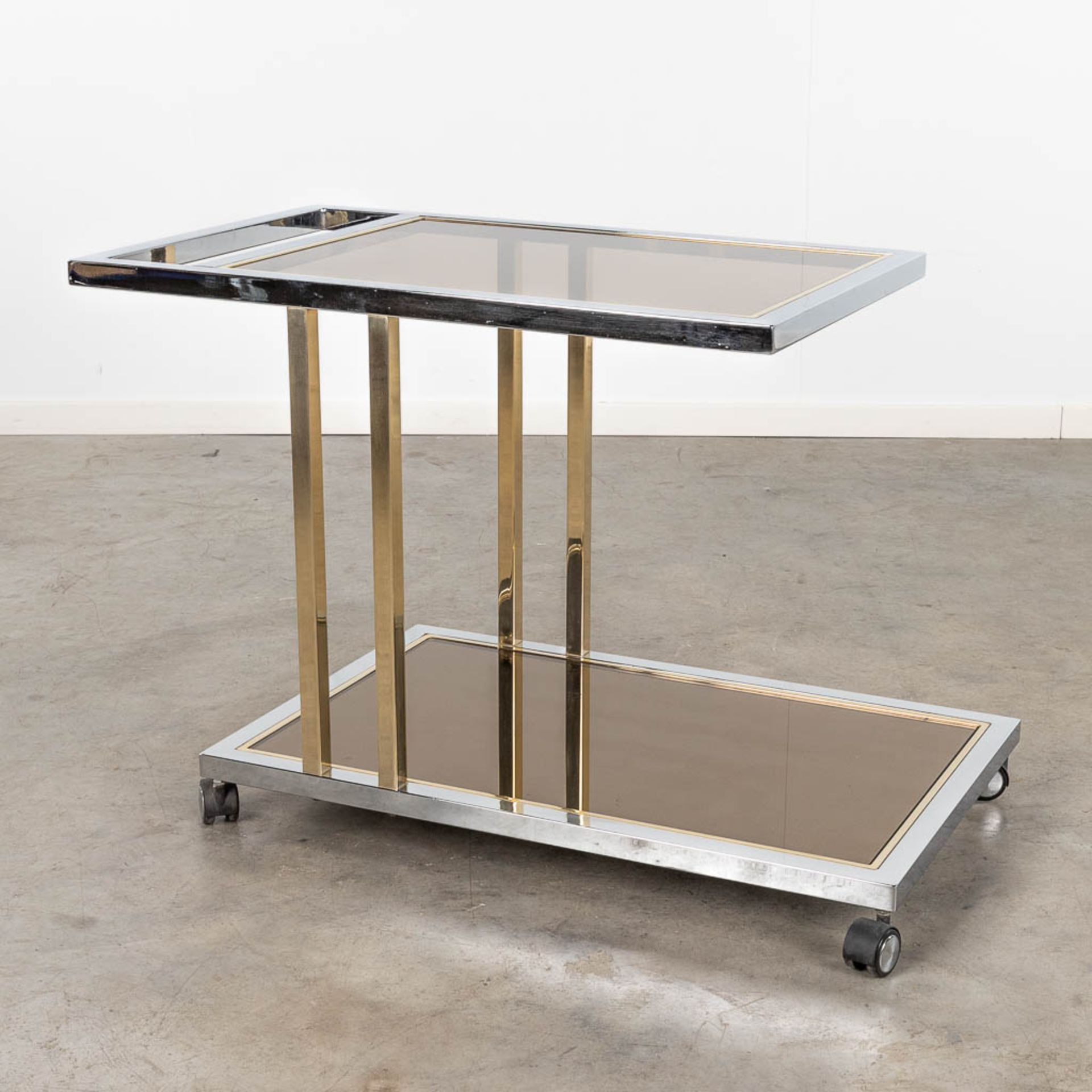 Belgo Chrome, a chromed and gold-plated bar cart. Circa 1980. (L: 53 x W: 100 x H: 67 cm)