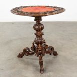 A side table, hunting style with oak sculptures. 19th C. (H: 70 x D: 65 cm)