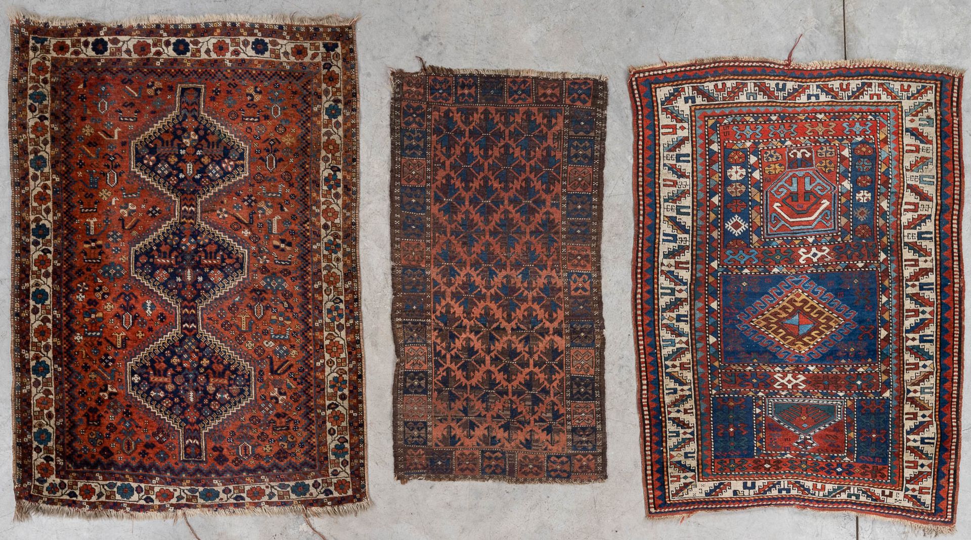 A collection of 3 Oriental hand-made carpets, probably Caucasian. (L: 157 x W: 116 cm)