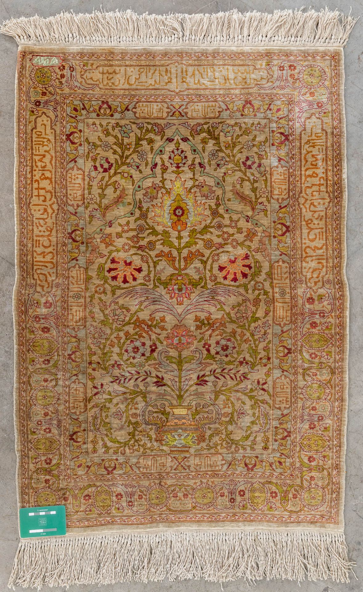 An Oriental hand-made carpet, silk. (L: 92 x W: 62 cm) - Image 2 of 11