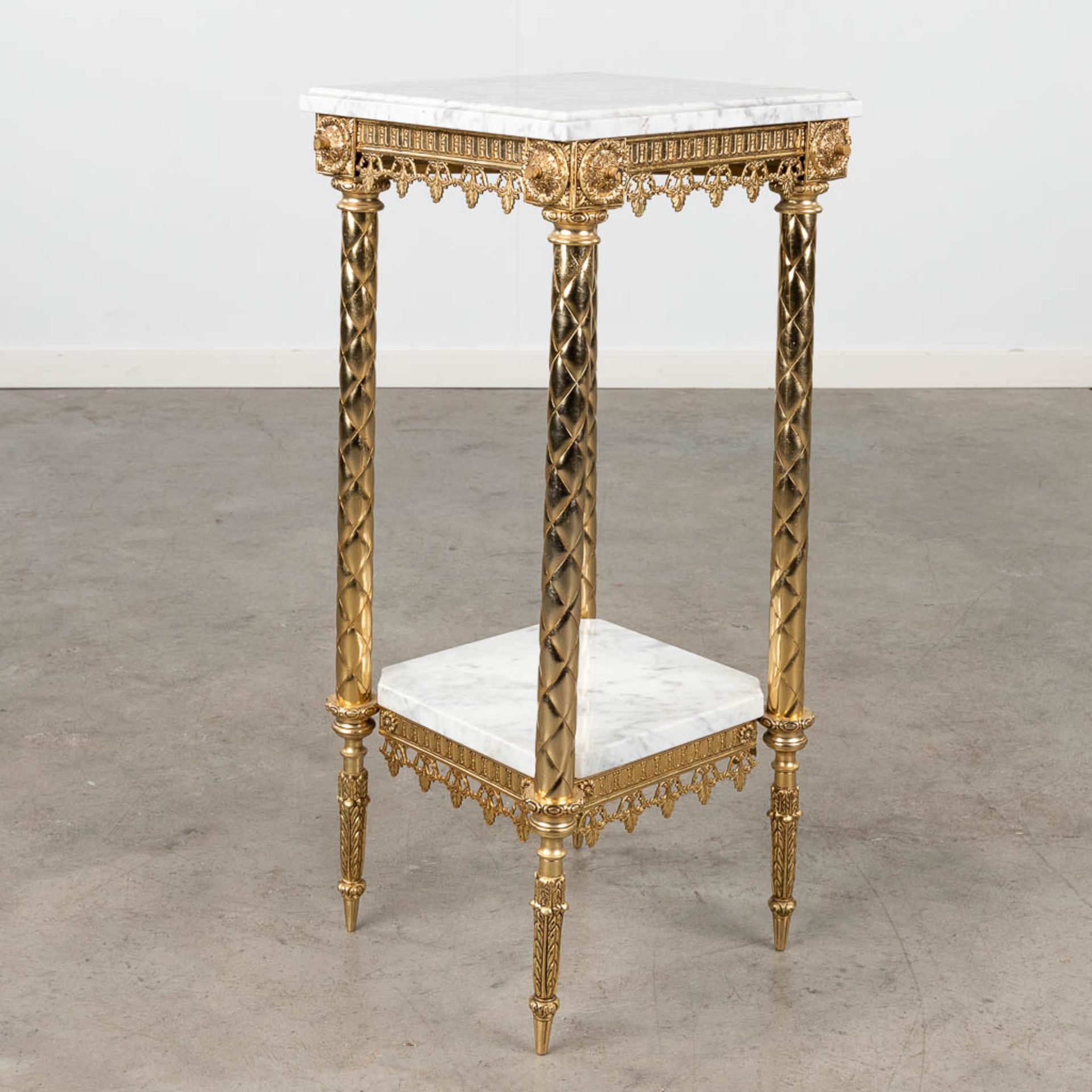 A pedestal, brass and white marble. 20th C. (L: 34 x W: 34 x H: 72 cm)