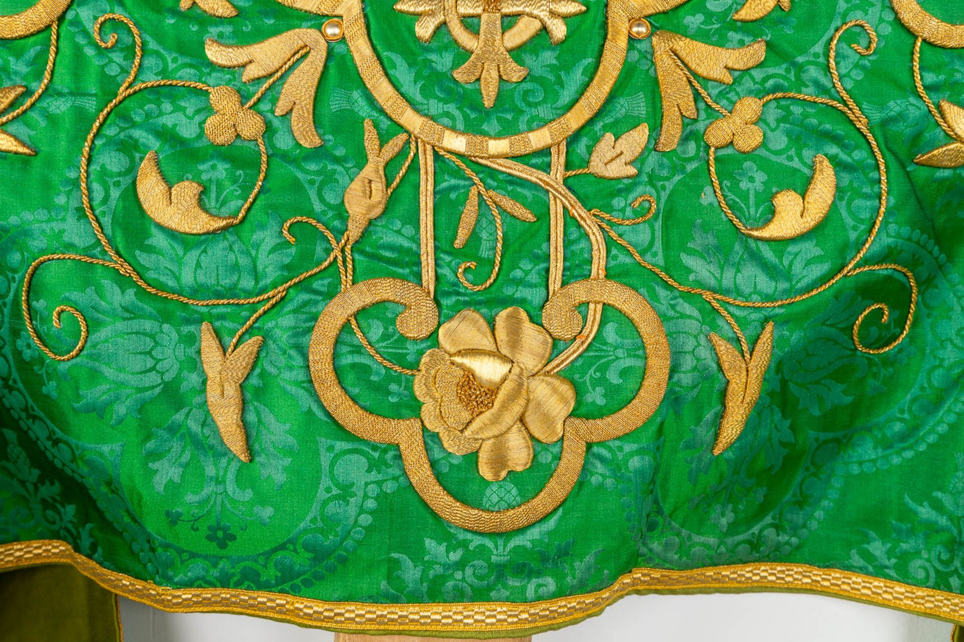 A Cope and Humeral Veil, finished with thick gold thread and green fabric and the IHS logo. - Image 12 of 14