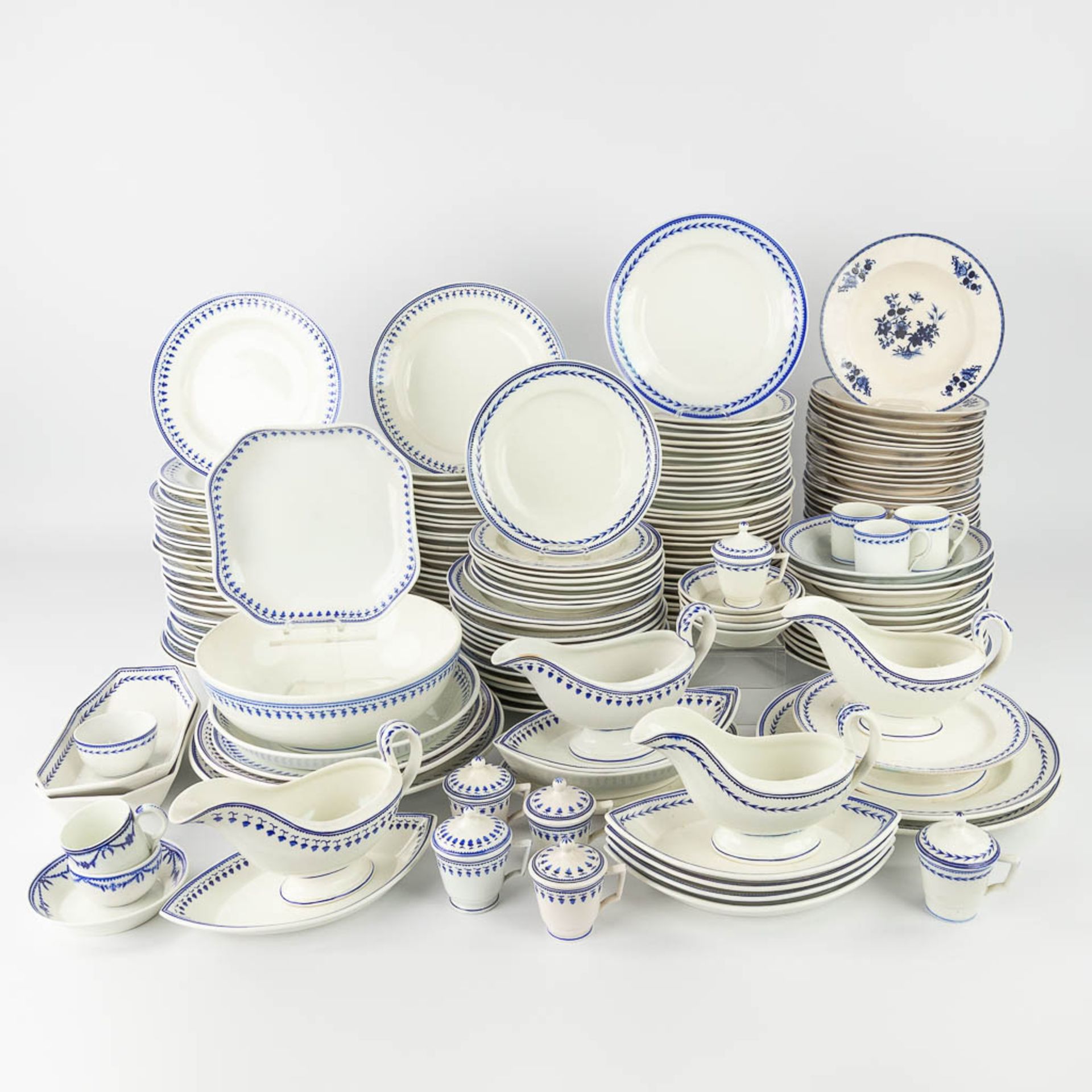 Tournai ceramics, a very large collection of faience plates, saucers and serving accessories. 174 pi