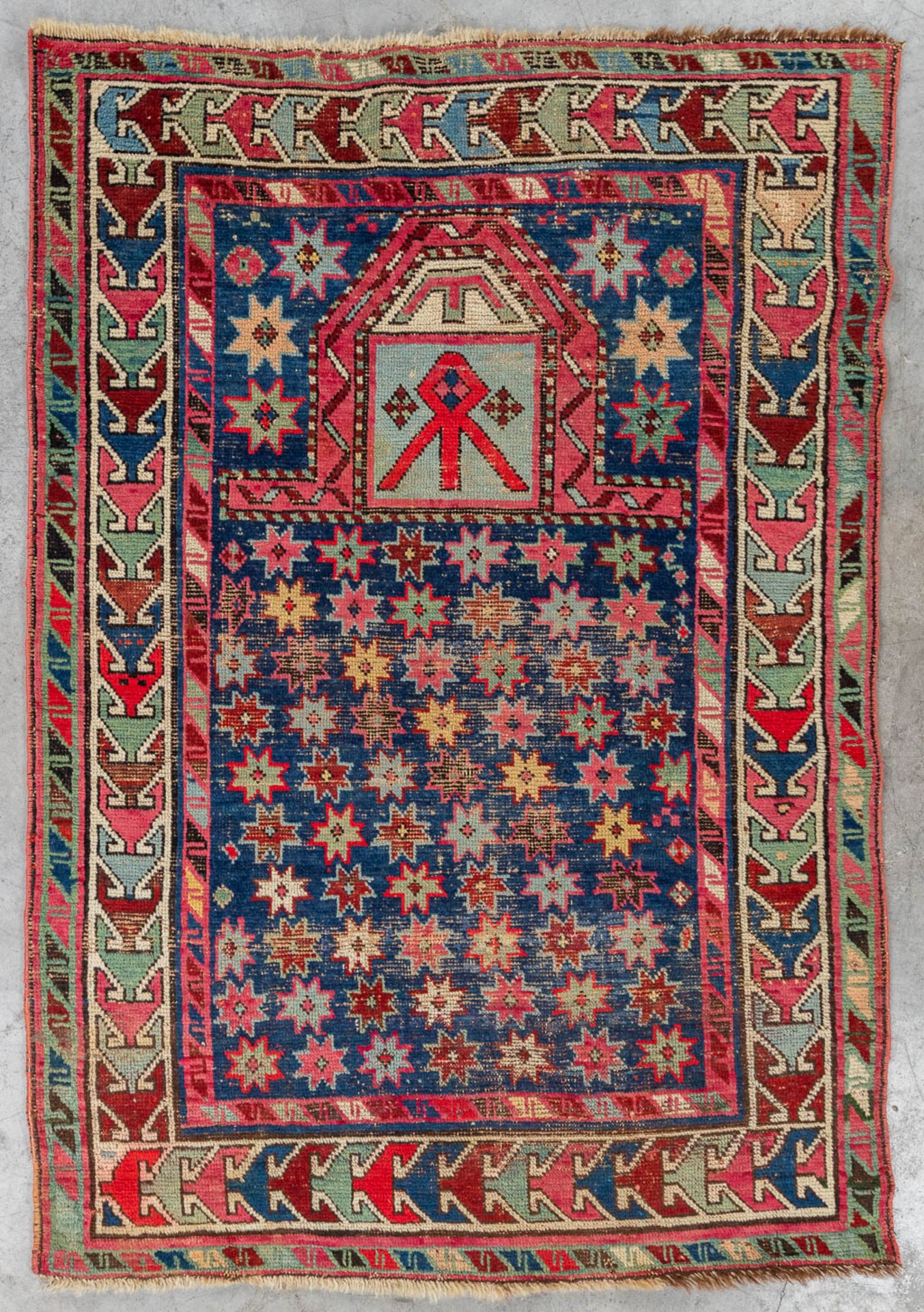 An antique hand-made Oriental prayer carpet, Karabach. (L: 134 x W: 96 cm)