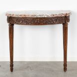 A wood-sculptured console table with a marble top. 18th C. (L: 46 x W: 91 x H: 77 cm)