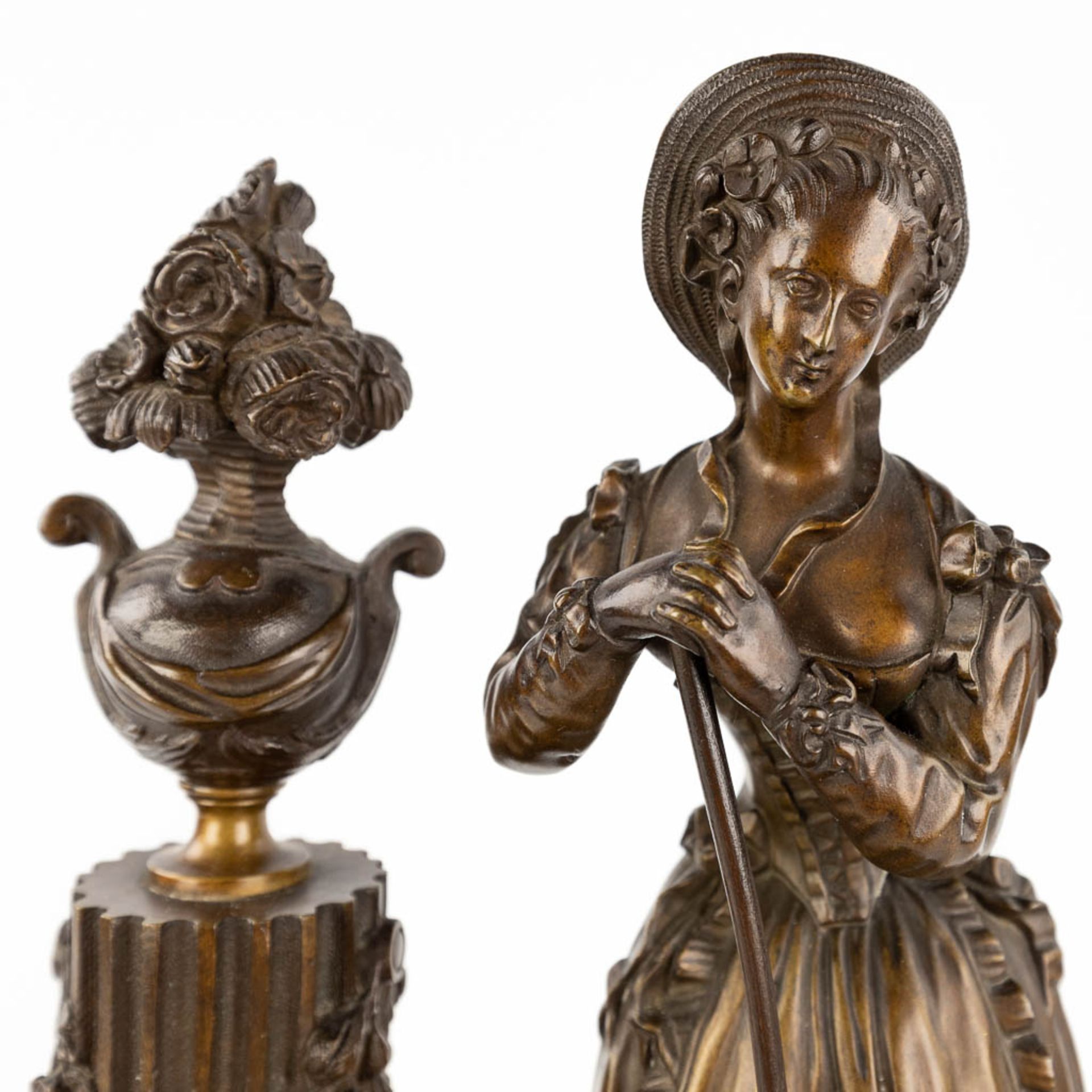 A black marble and bronze mantle clock 'Lady with a rake' 19th C. (L: 12 x W: 22,5 x H: 44 cm) - Image 11 of 12