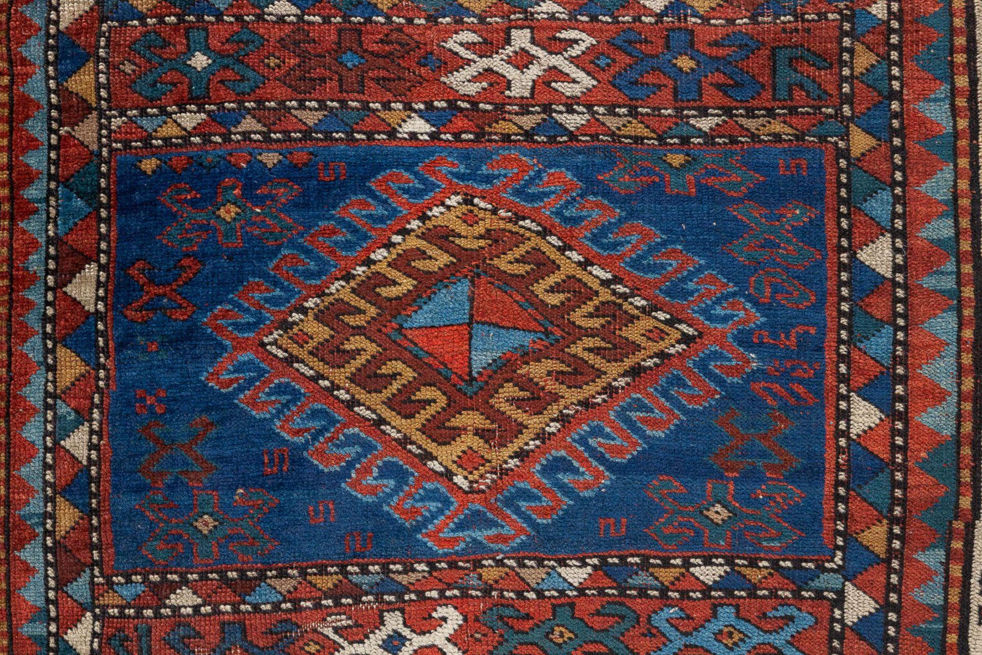 A collection of 3 Oriental hand-made carpets, probably Caucasian. (L: 157 x W: 116 cm) - Image 7 of 11