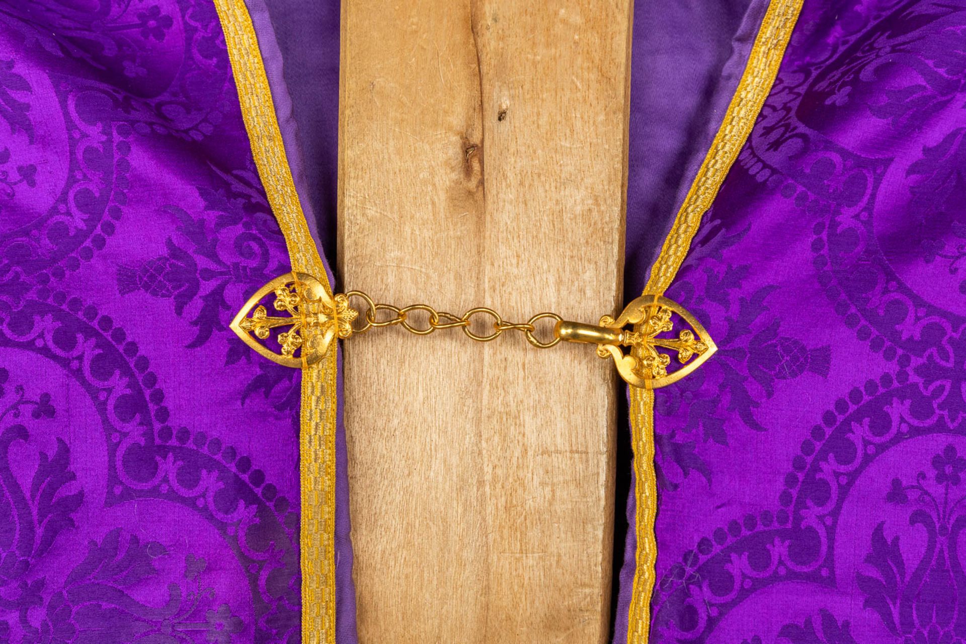 A Cope and Humeral Veil, finished with thick gold thread and purple fabric and the IHS logo. - Image 6 of 12